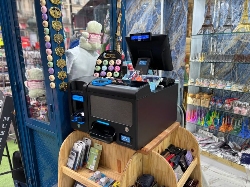 Monnayeur Automatique dans un magasin de souvenir